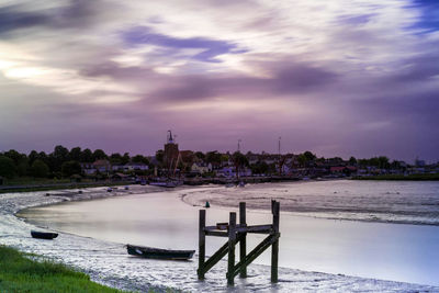 View of calm sea against cloudy sky