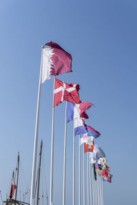 Flags of nations qualified for world cup qatar 2022 hoisted at doha corniche, qatar.
