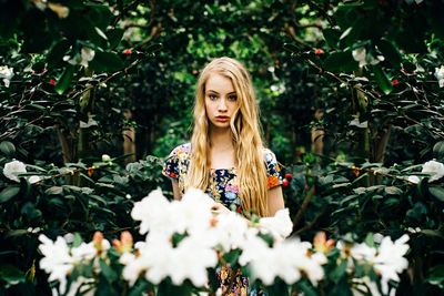 Portrait of smiling young woman in park