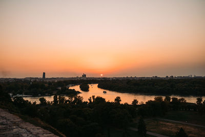 Scenic view of landscape against sky during sunset