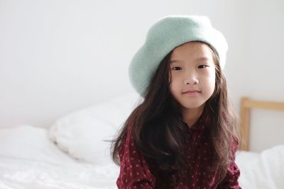 Portrait of cute girl in bed