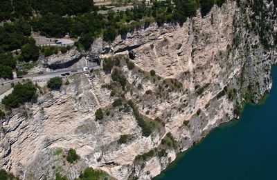 High angle view of rocks and trees in mountains