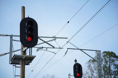 Red lighted railroad signals