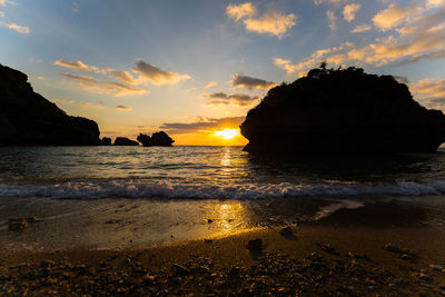 Scenic view of sea against sky during sunset