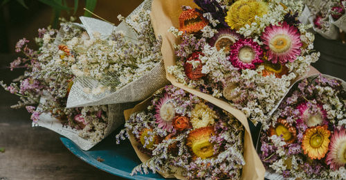 High angle view of various flowers in market for sale