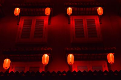 Low angle view of illuminated building at night