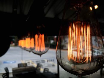 Close-up of illuminated light bulb