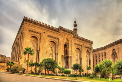 View of historical building against cloudy sky