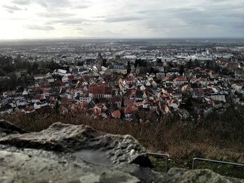 Aerial view of cityscape against sky