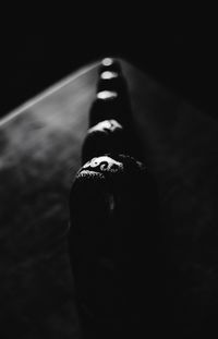 High angle view of drink on table against black background