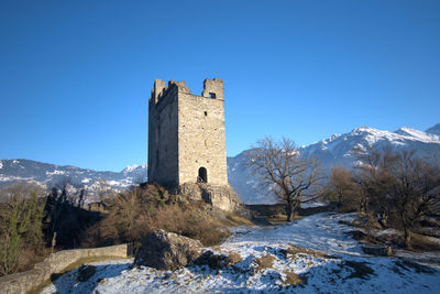 Historic old ruin in a beautiful mountain panorama in wartau in switzerland 10.1.2021