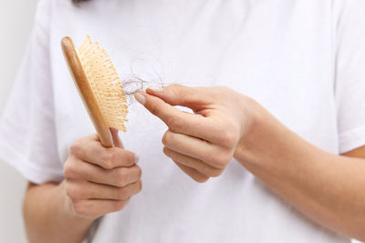 Midsection of man holding food