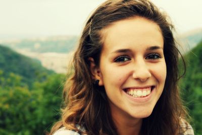 Portrait of smiling young woman