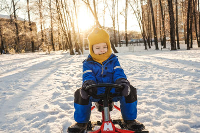 Portrait of child in snow