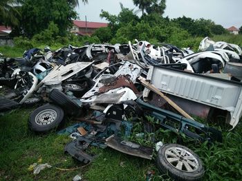 Abandoned car on field