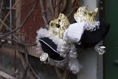 Basel carnival 2018. basel, switzerland - feb 19th, 2018. two carnival masks hanging besides a door