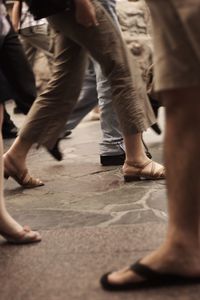 Low section of people walking outdoors