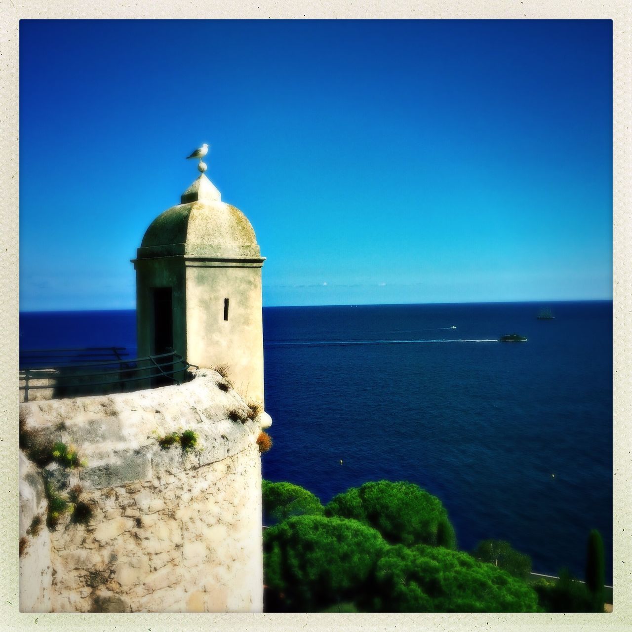 VIEW OF CALM SEA AGAINST CLEAR SKY