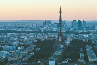 Aerial view of city buildings during sunset