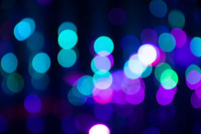 Defocused image of illuminated lights at night