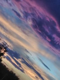 Low angle view of dramatic sky during sunset