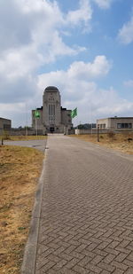 View of building against cloudy sky