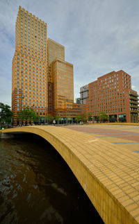 Buildings in city against sky