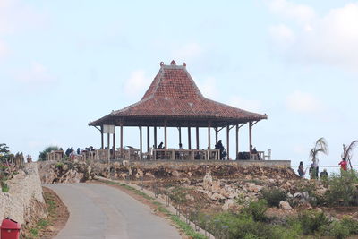 Old temple building against sky