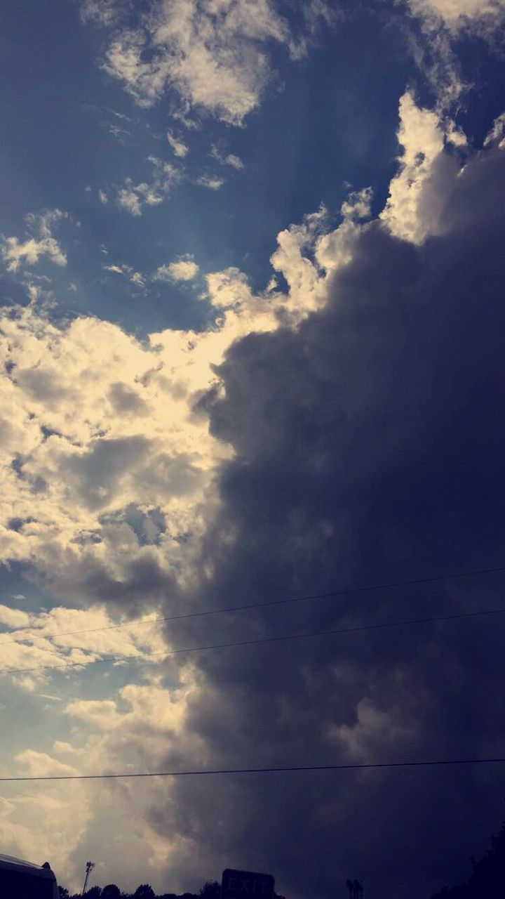 low angle view, sky, scenics, beauty in nature, tranquility, power line, cloudscape, cloud - sky, cloud, tranquil scene, blue, nature, power cable, majestic, day, power supply, sky only, dramatic sky, outdoors, cable, atmosphere, cloudy, atmospheric mood, heaven, storm cloud, softness, ominous