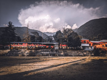 Train against sky with mountain range in background