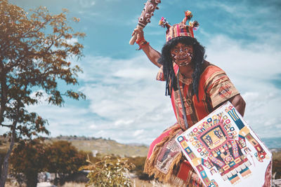 Representation of inca warrior dressed and with battle weapons, prehispanic warrior fighting in peru