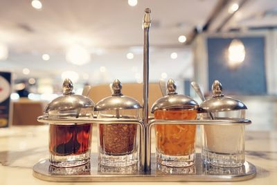 Close-up of food in containers on table at restaurant