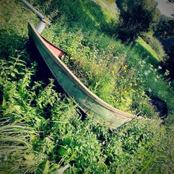 High angle view of abandoned boat moored at shore