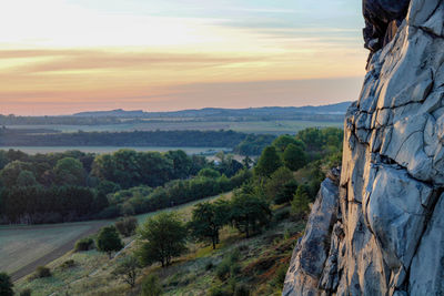 Scenic view of landscape against sky during sunset