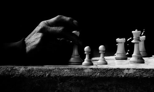 Low angle view of chess pieces on table