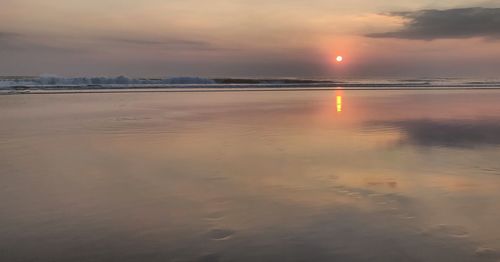 Scenic view of sea during sunset