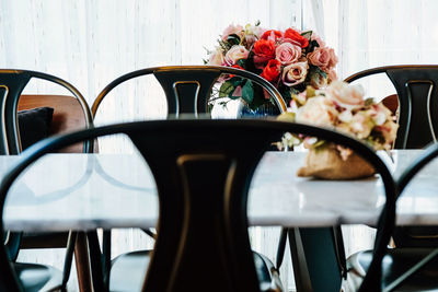 Elegant home decoration details, beautifully decorated table with flowers