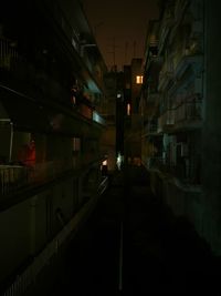 Illuminated building in city at night