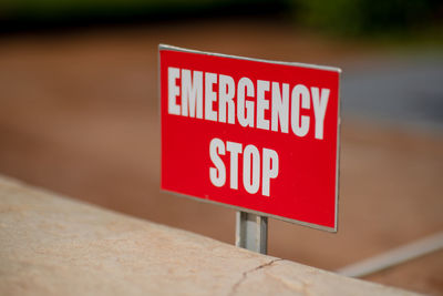 Close-up of warning sign on wall
