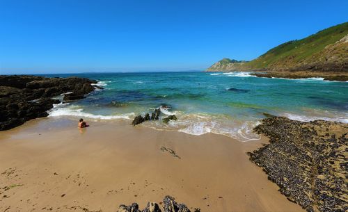 Scenic view of sea against clear sky