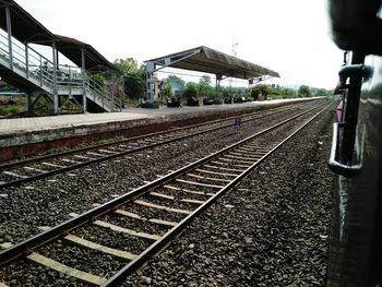 Railway tracks against clear sky