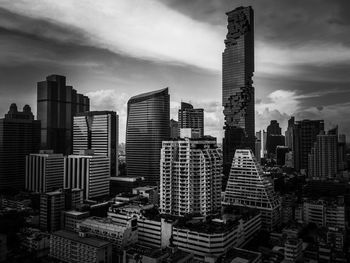 Modern buildings in city against sky