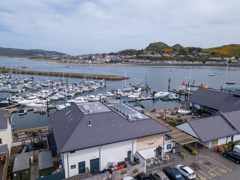 High angle view of harbor by buildings in city