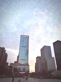 Skyscrapers in city against sky