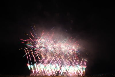 Firework display at night