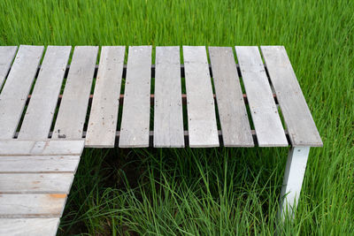 High angle view of bench in park