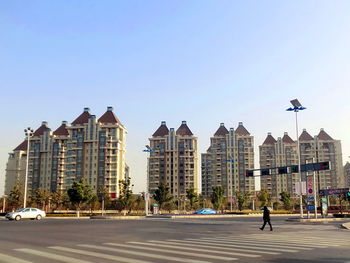 View of city street against clear sky