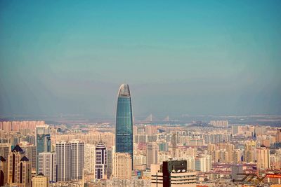 Modern cityscape against sky