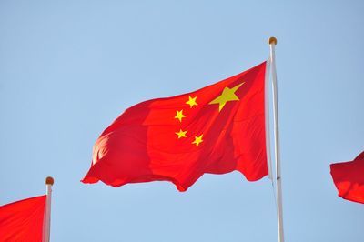 Low angle view of flags of china