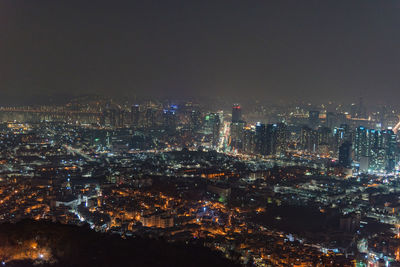 Illuminated cityscape at night